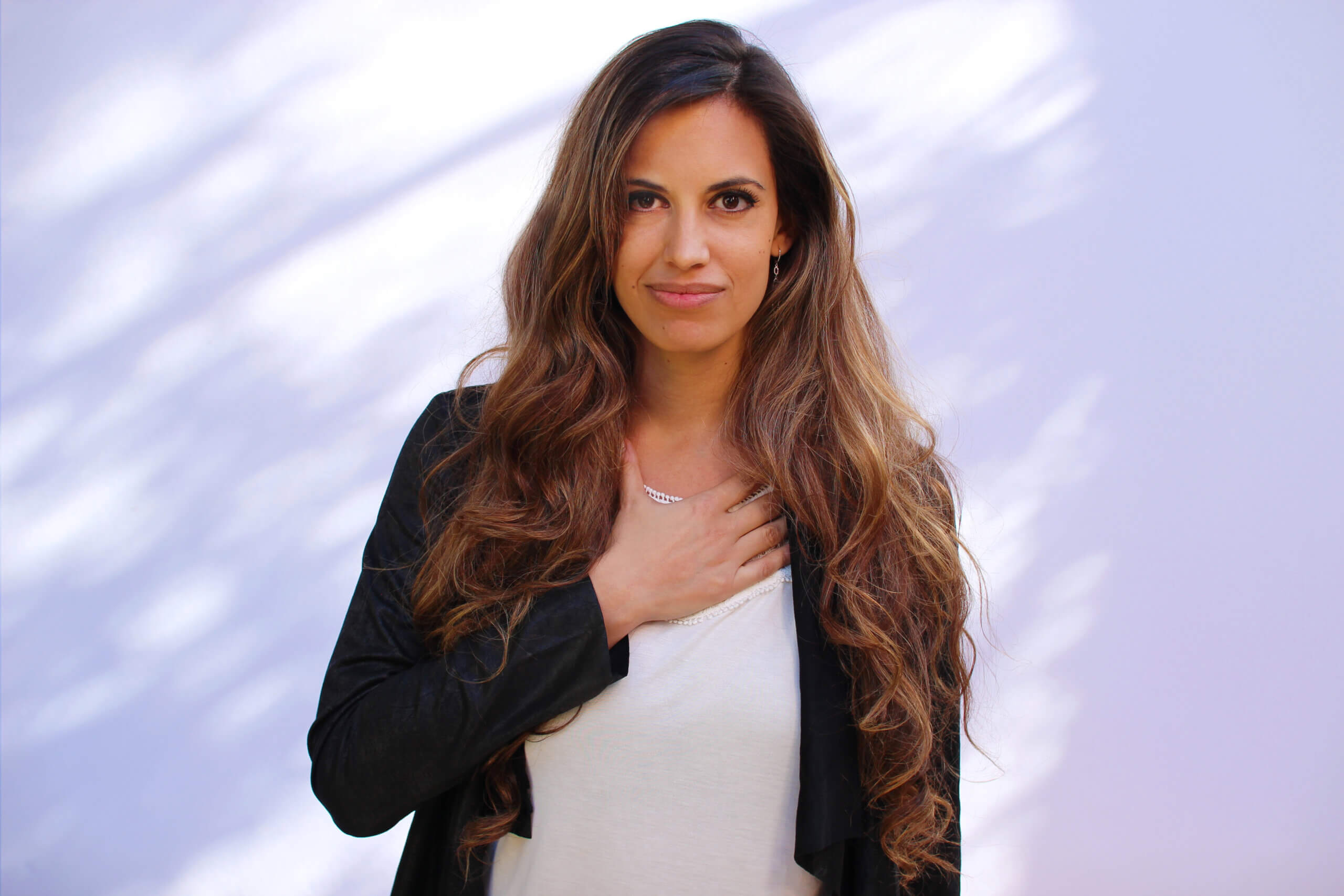 Danielle-ford-ccsd-state-board-candidate Danielle Ford profile photo with right hand over chest